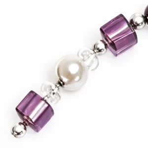 Plum Spark Wristlet — The ivory round, two purple cubes and original clear intervals.. AI styling visualization.